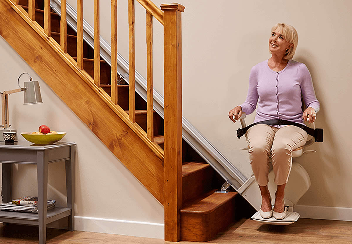 Old lady using Stairlift